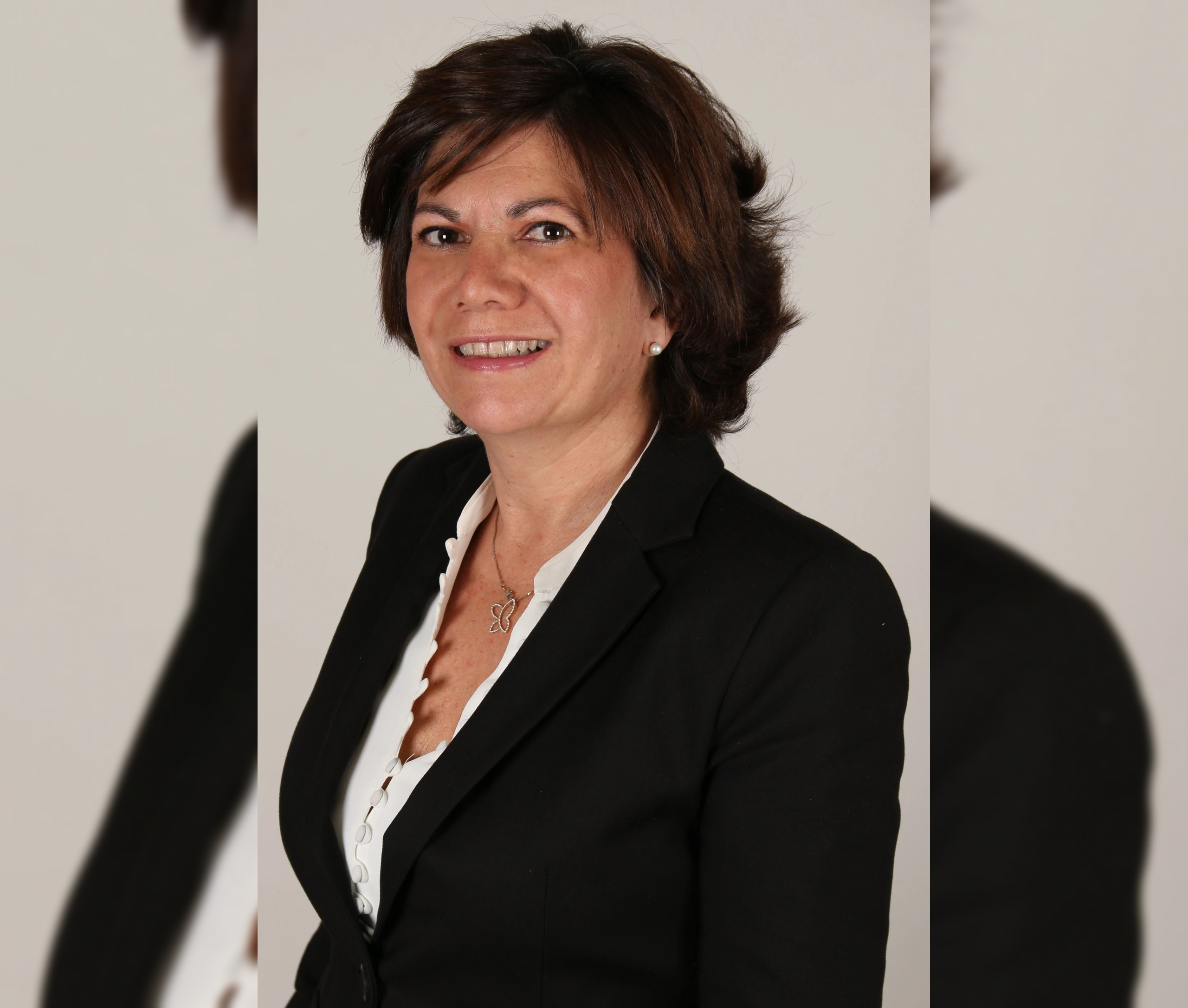 https://www.discovery-leadership.com/wp-content/uploads/2024/06/Paola_Ravina_with_bgc.png